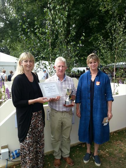 Alison Fisher with Carl Gerrard, winner of most sustainable garden