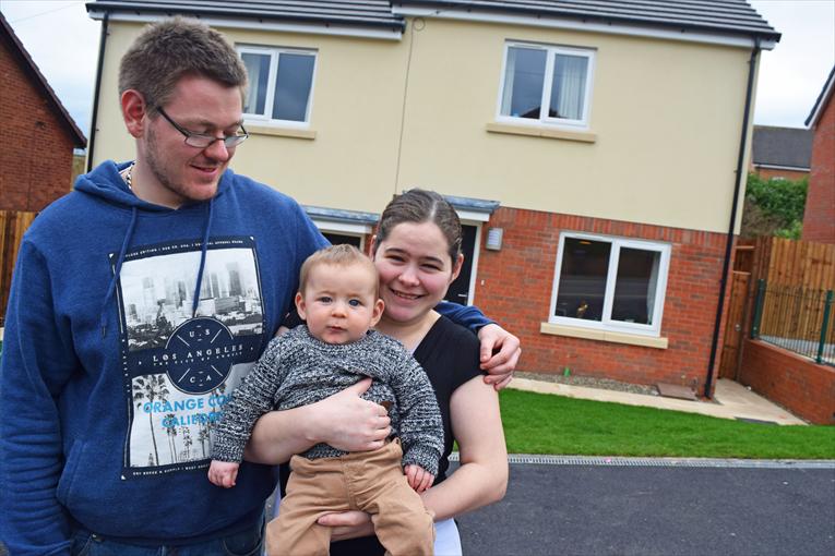 Young family at their new home