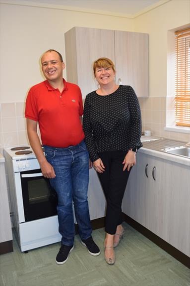 Mr Jasper and his housing exec in new kitchen