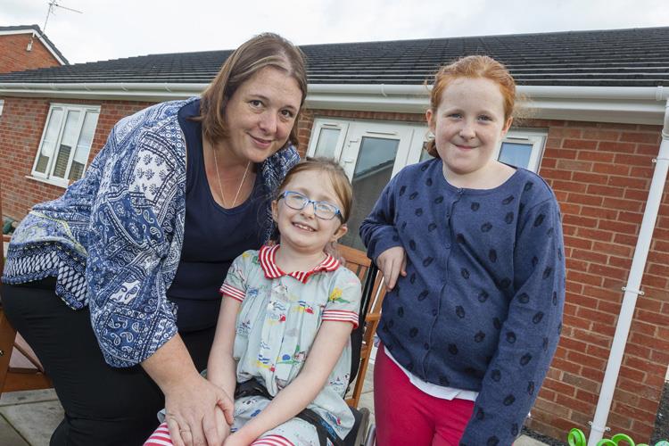 Martha with her Mum and sister