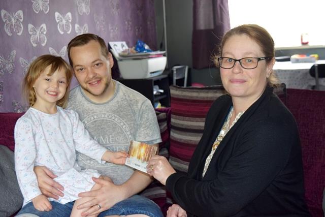 Tom and daughter Avril with Jeanette, a Housing Executive from Dawley shop.